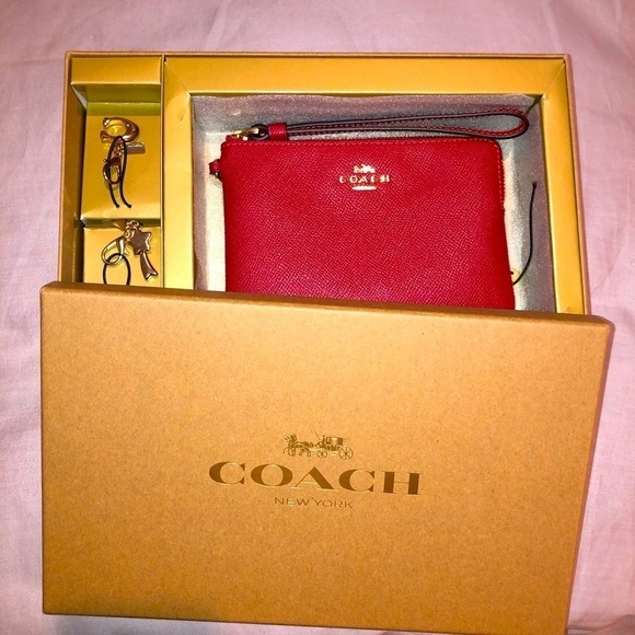 Coach Handbags - NIB Coach Red Wristlet with Charms
